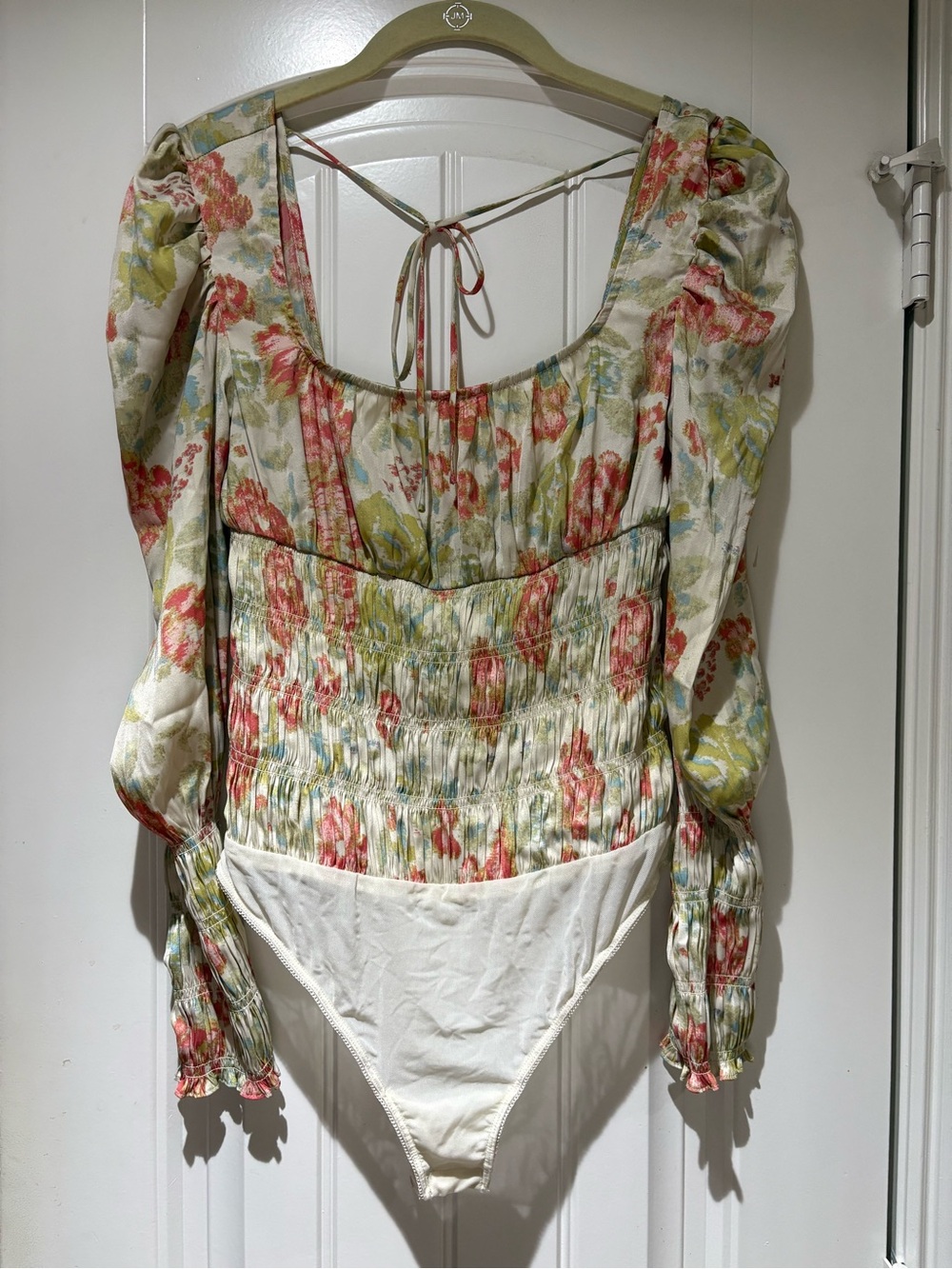 Free People Floral Smocked Long-Sleeve Bodysuit in Cream and Coral